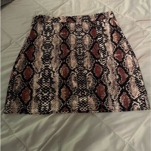 Snakeskin mini skirt with slit
